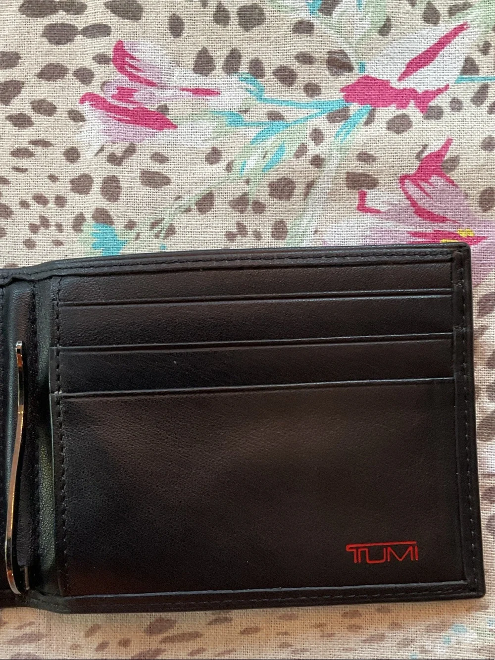 Tumi compact triple